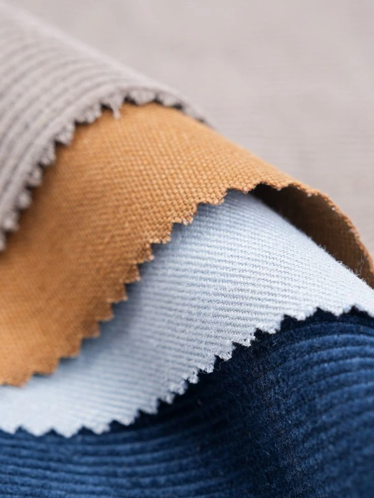kain american drill beberapa warna yang terlihat detail teksturnya
