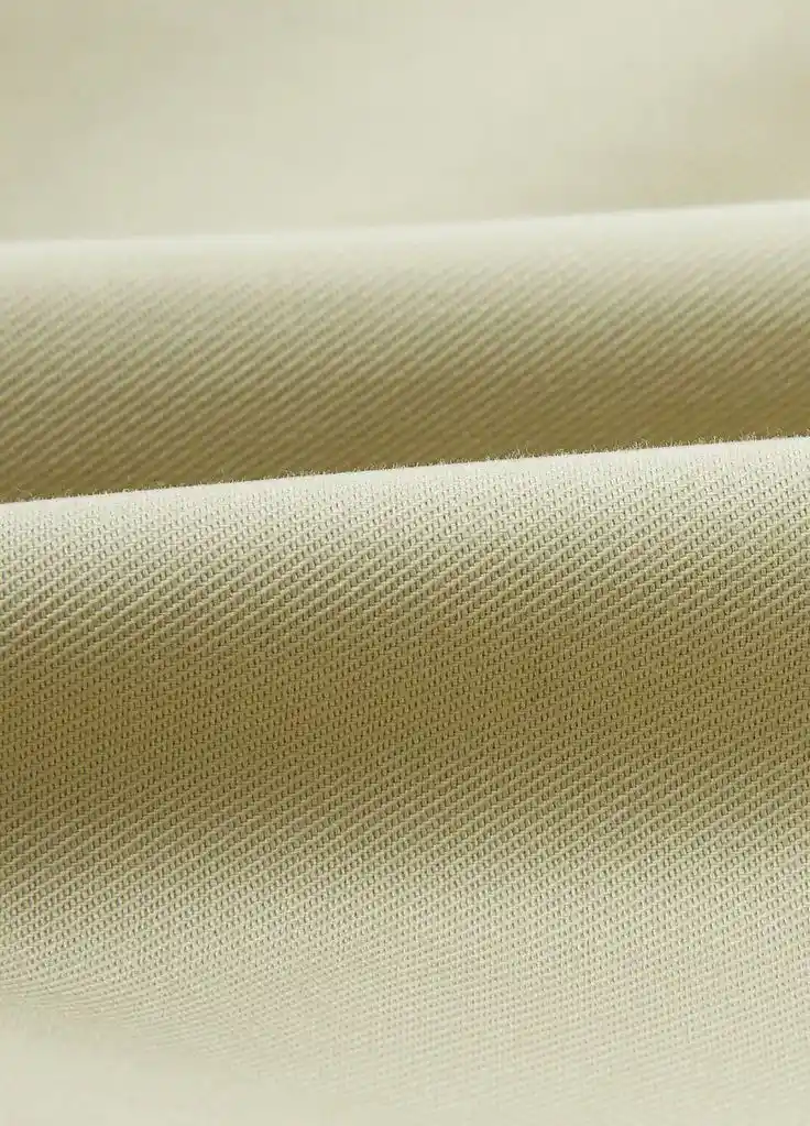 kain twill tebal warna cream dengan tekstur terlihat jelas