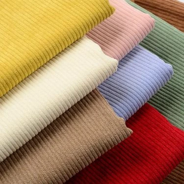 Kain Corduroy bertekstur garis timbul dengan bermacam warna, cocok untuk jaket elegan dan kasual.